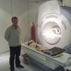 Valery Kniga performs scheduled maintenance of medical magnetic-resonance tomograph (MRT)